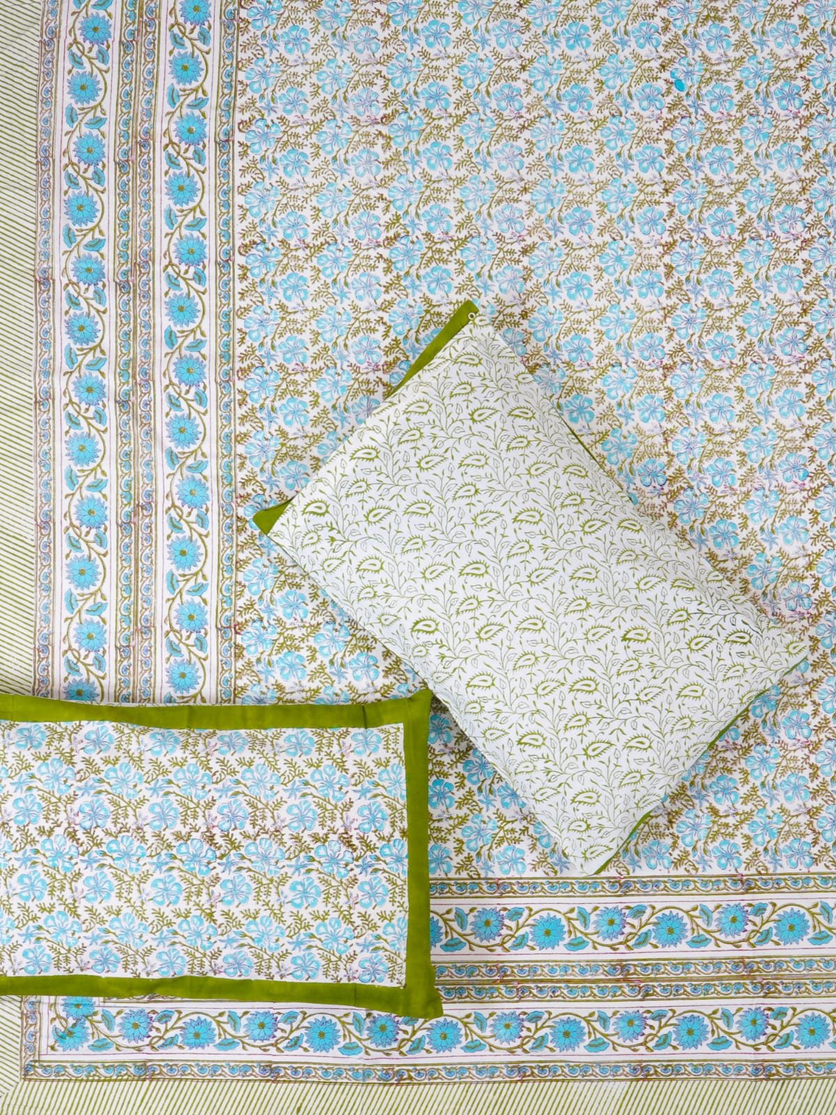 Decorative tablecloth with floral and paisley patterns on a blue and green background